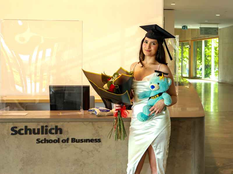 Graduation photography in Toronto capturing a graduate in cap and gown celebrating a milestone achievement.